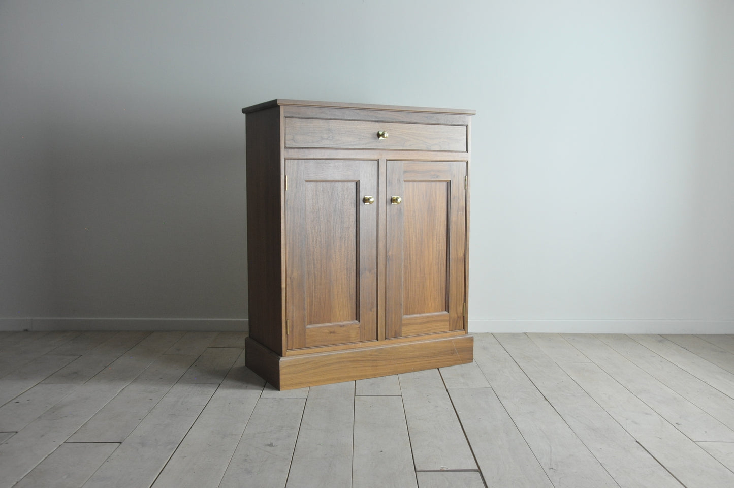 Bespoke american walnut tall side cabinet