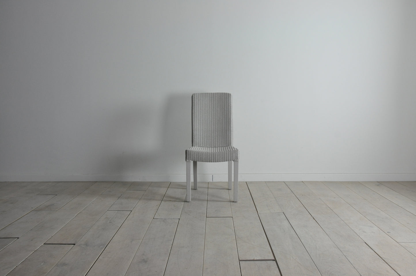 Neptune Montague Lloyd Loom dining chair in pale stone