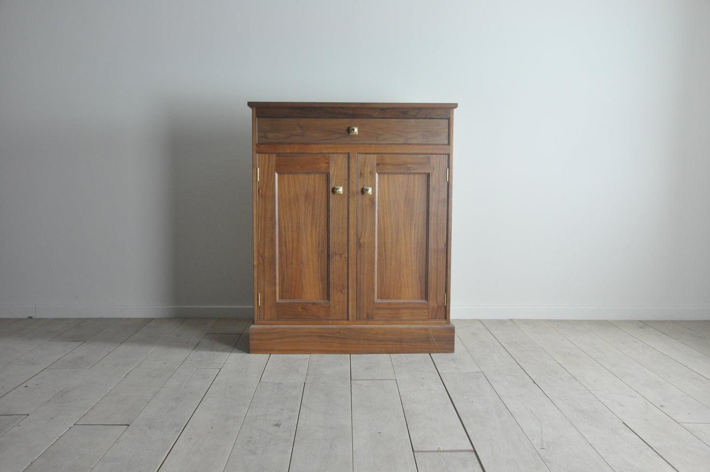 Bespoke american walnut tall side cabinet