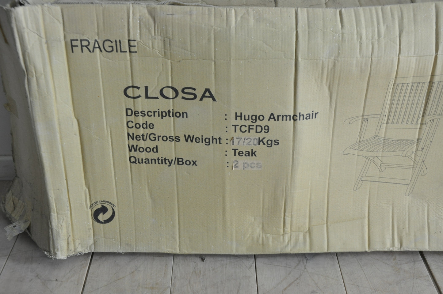 Folding teak armchair