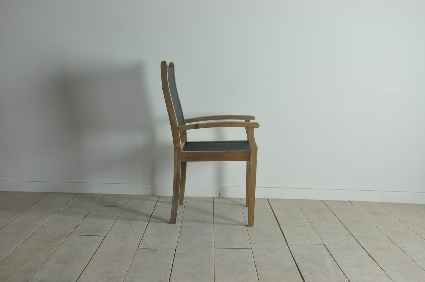 Neptune teak carver chair with black textylene seat and back
