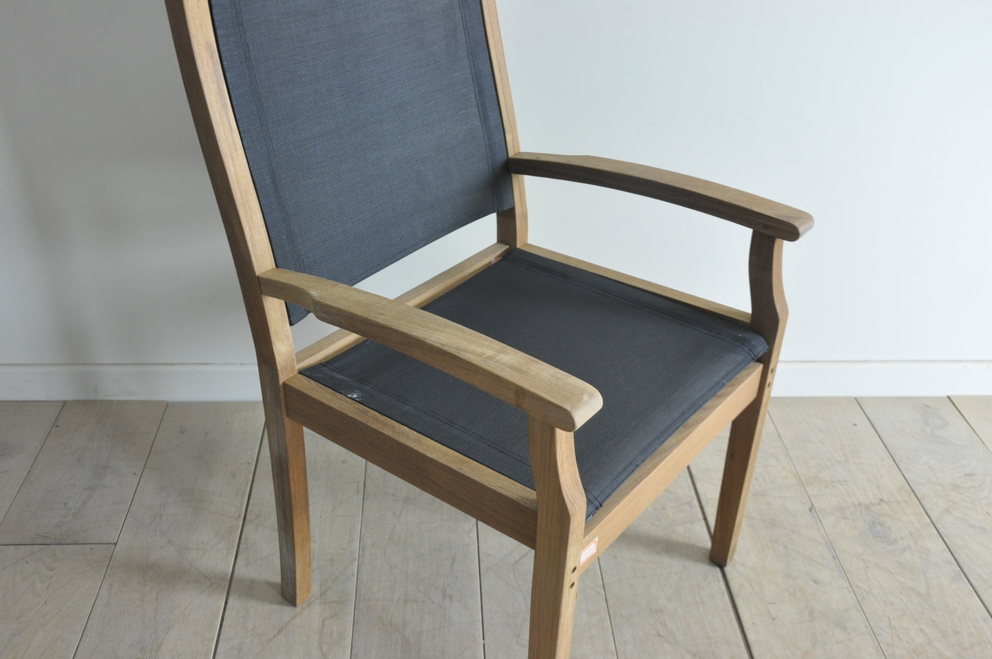 Neptune teak carver chair with black textylene seat and back