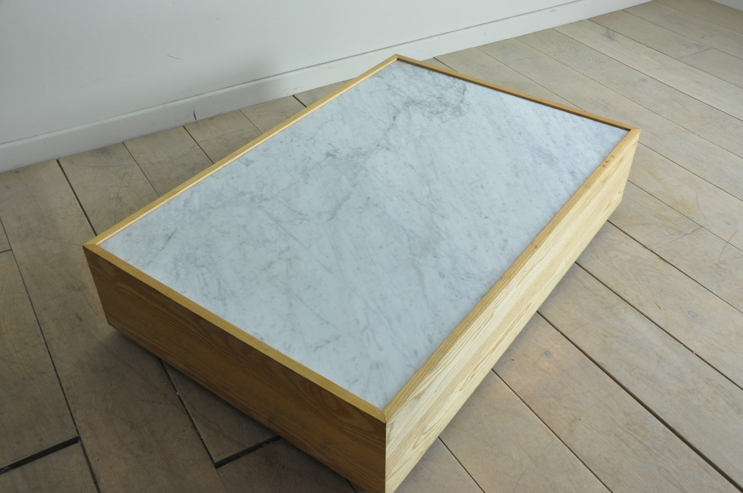 Rectangular low coffee table with Carrara marble top and pine base